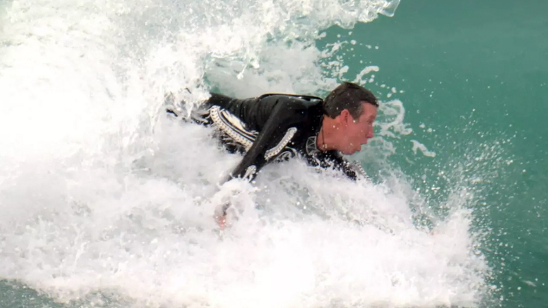 Illustration for article titled The Foam Fins Covering This Wetsuit Let You Body Surf Without a Board